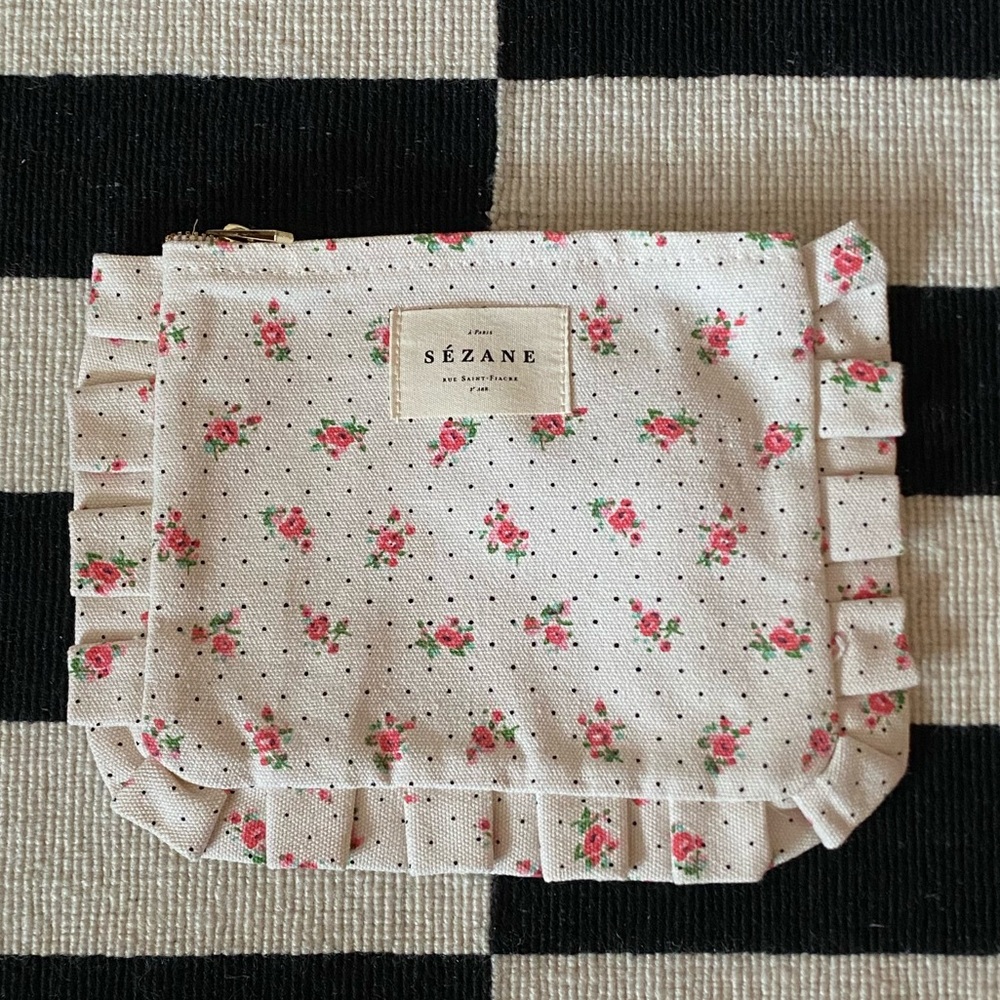 sezane floral ruffled pouch with zipper